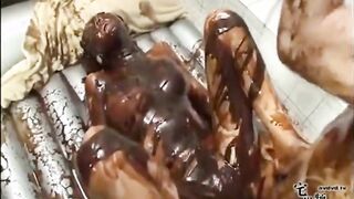 Japanese woman drizzled with chocolate during sex