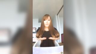 Hitomi explains how heavy her boobs can be