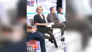 Marie Inbona showing legs on TV