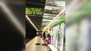 Couple having sex at a metro station in Barcelona in front of pretty much everyone