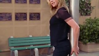 Sarah Chalke dancing against one luck pole (xpost - /r/SarahChalke)