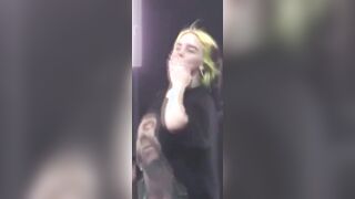 Billie Eilish bouncing her massive melons under her shirt