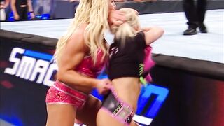 Alexa Bliss receiving multiple wedgies