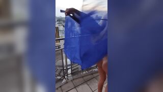 on a highrise balcony gif